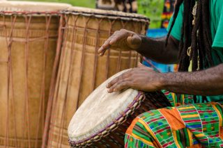 Abasi Hanif plays the djembe drum