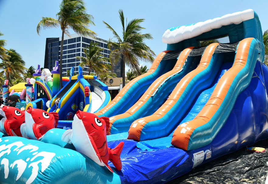 Beach Party in Fort Lauderdale with waterslides, parachute jump, vintage vehicles & it's free